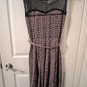 Light pink and black dress.